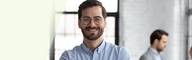 Smiling professional looking at camera